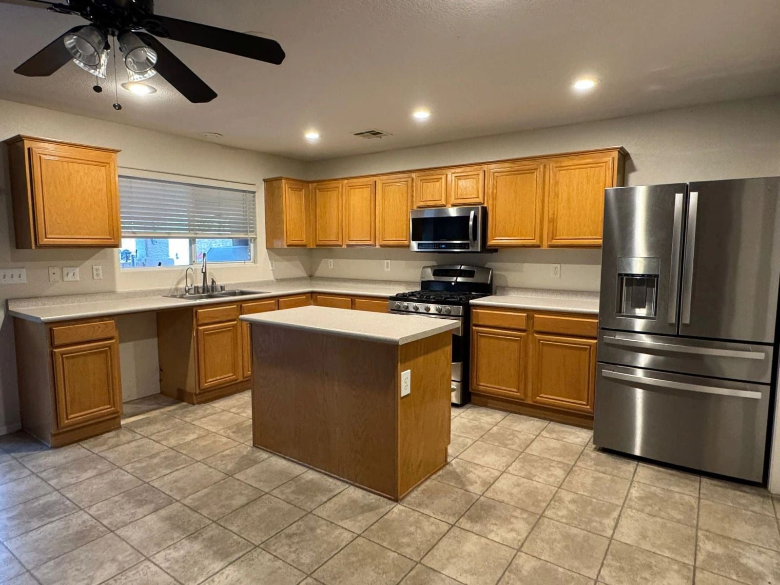 Kitchen before remodel with oak cabinets Las Vegas
