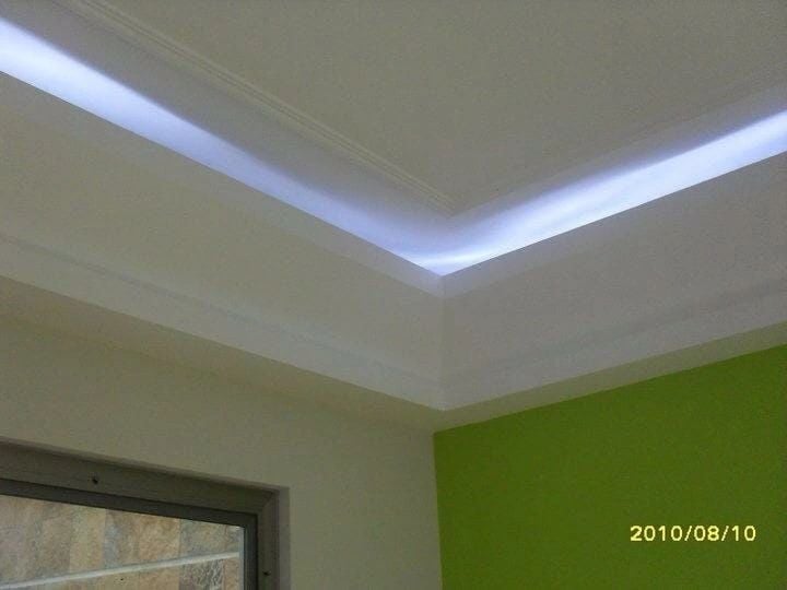 Green accent wall with LED cove lighting Las Vegas