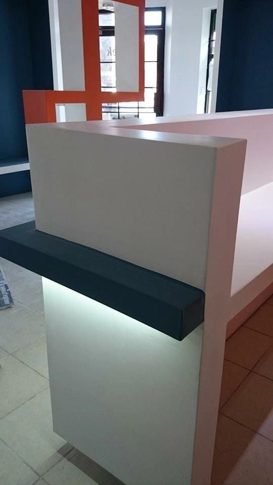 Custom reception desk buildout with accent lighting Las Vegas