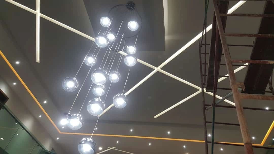 Statement chandelier and custom ceiling installation Las Vegas